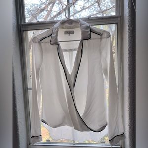 Brand: WAYF 
Sized: XS
Color:Black & white
Style: Blouse